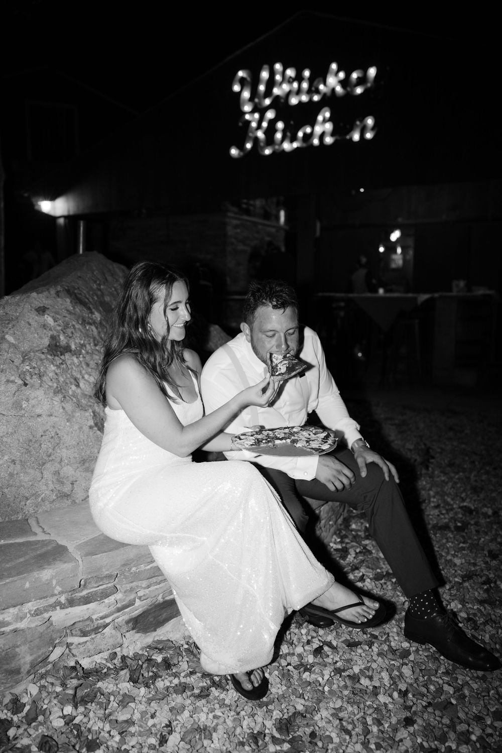 A series of black and white photos showing someone in white clothing lying on the ground at night.