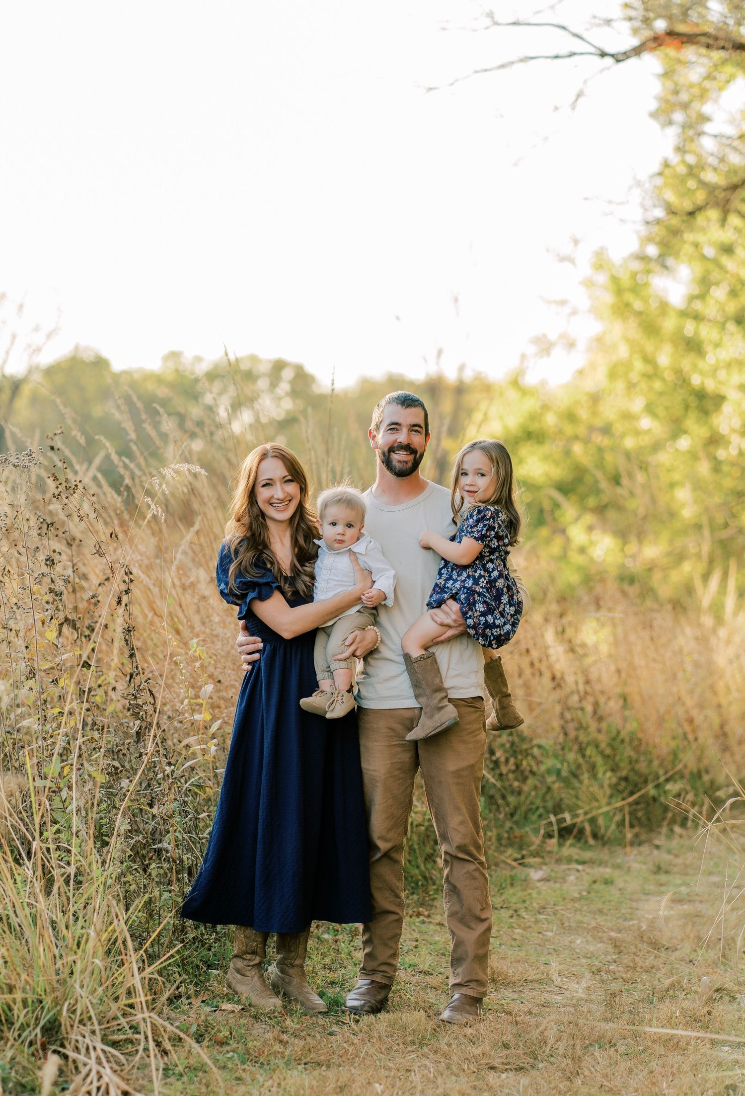 A joyful moment with my husband and two kids, capturing the love and connection that makes life so special in a beautiful outdoor location