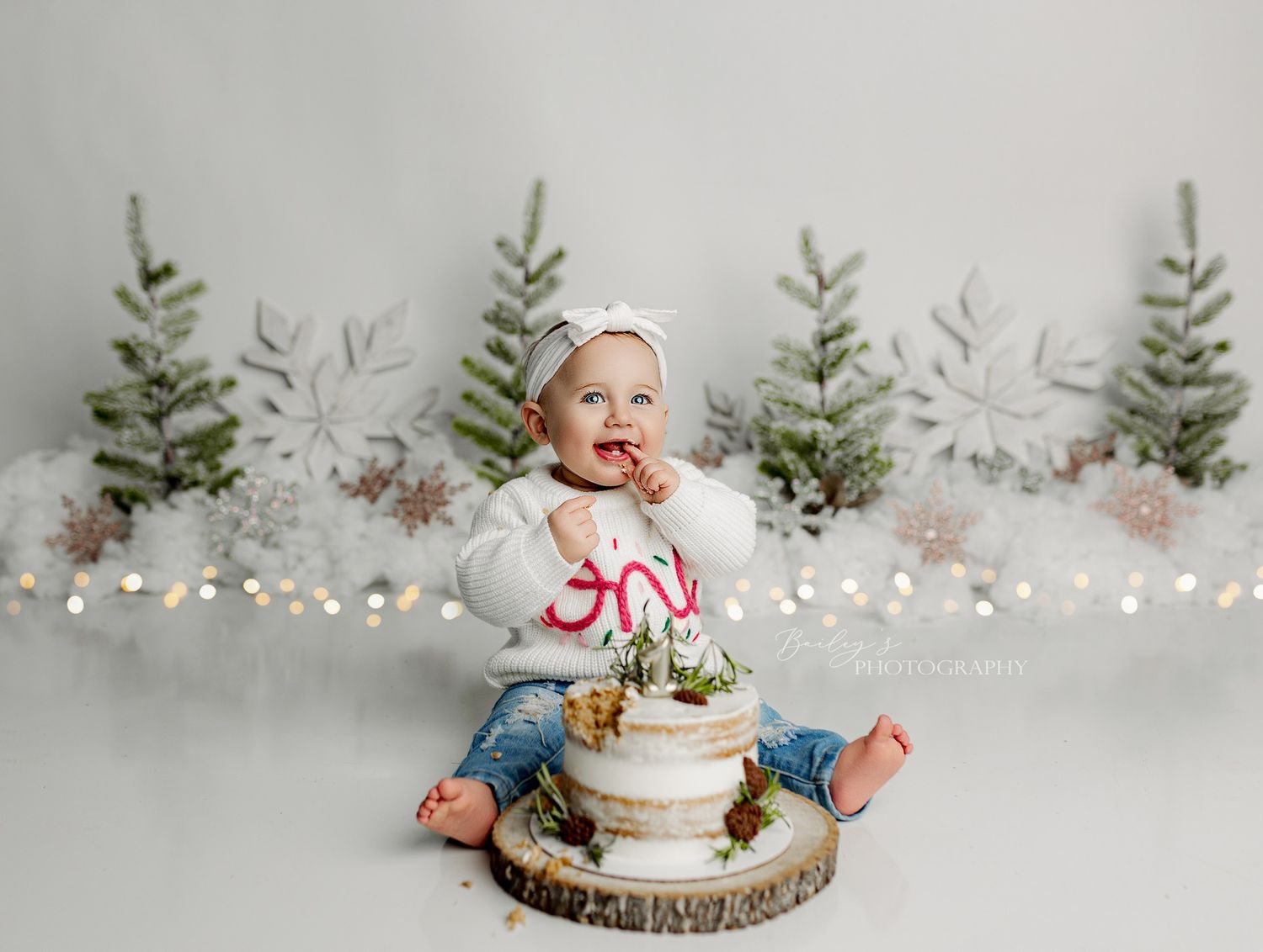Professional cake smash photography in Scioto County Ohio with themed decor, milestone styling, and studio lighting