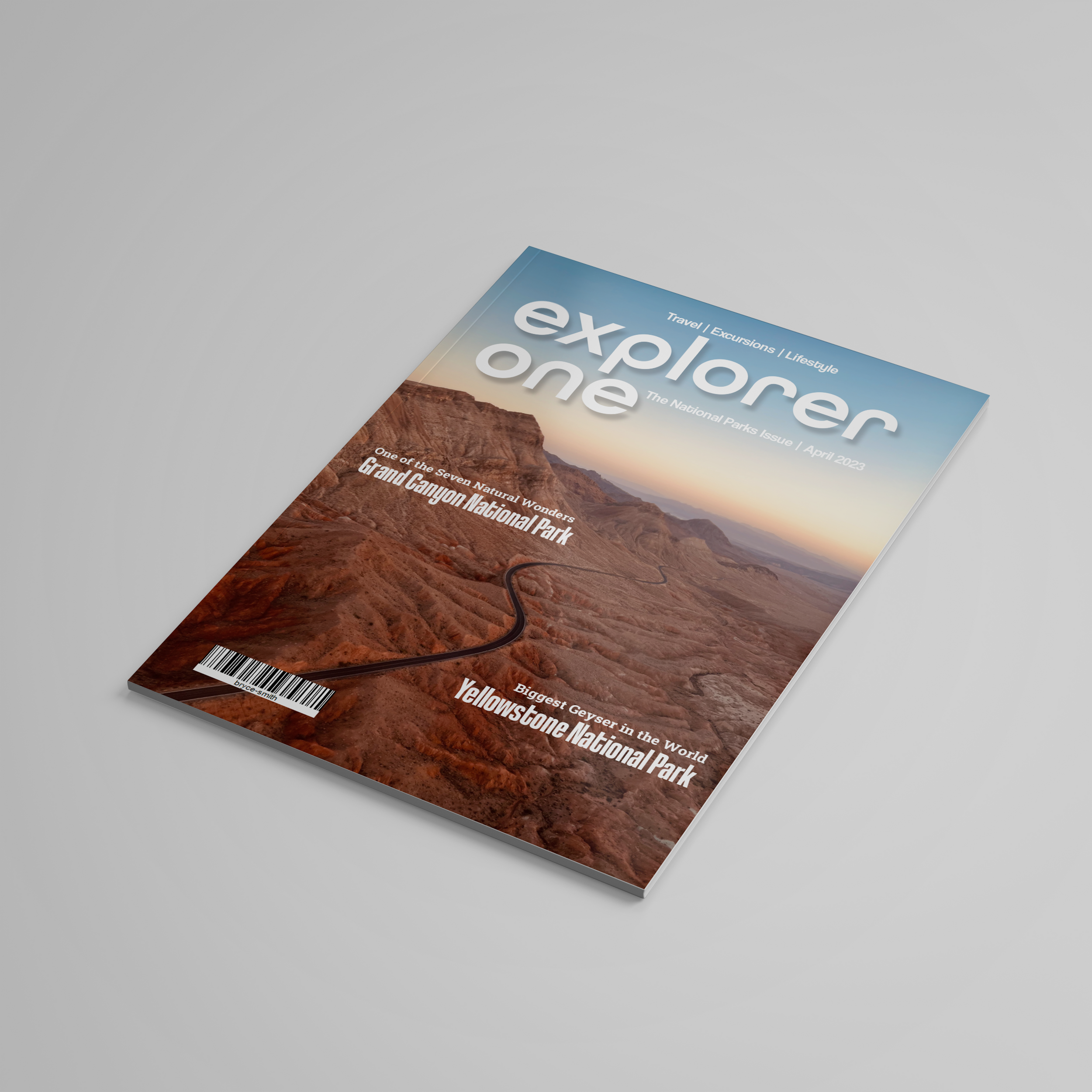 Travel magazine cover featuring desert canyon landscape at sunset with 'explorer one' title.