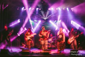 band playing festival stage