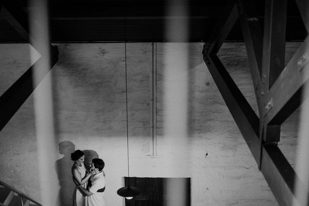 Emotional portrait of a couple during a destination engagement at the cellars, Quinta de Ventozelo, Douro Valley, Portugal.