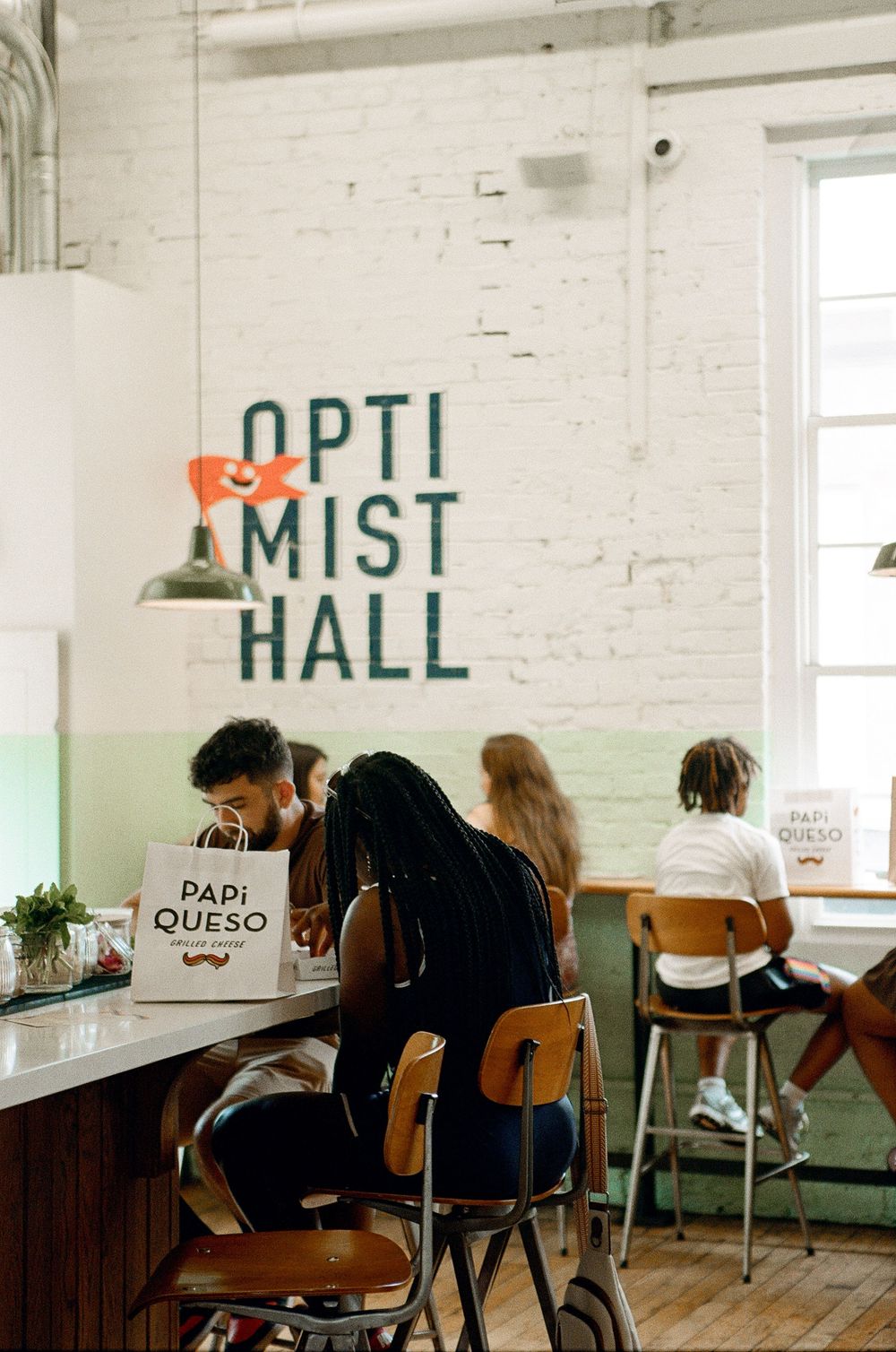 Film photo of Optimist Hall in Charlotte showcasing lettering on wall