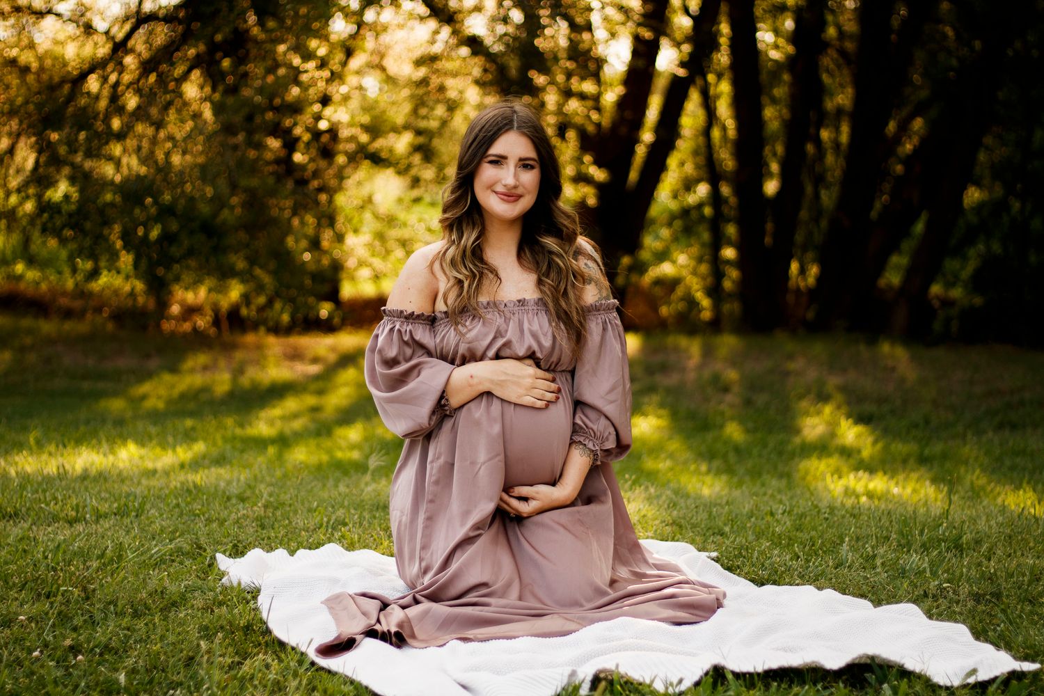 An expecting mother during a maternity photo session at The League House in Amarillo, Texas