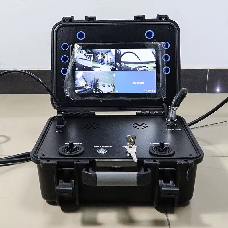 Rugged black portable inspection case with multi-camera monitor display and joystick controls for professional surveillance.