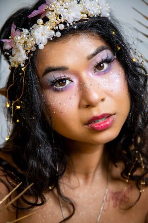 Close-up beauty portraits with floral crown, glitter makeup, and soft pink tones create an ethereal aesthetic.