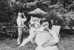 Vintage black and white photograph of people enjoying a casual outdoor gathering.