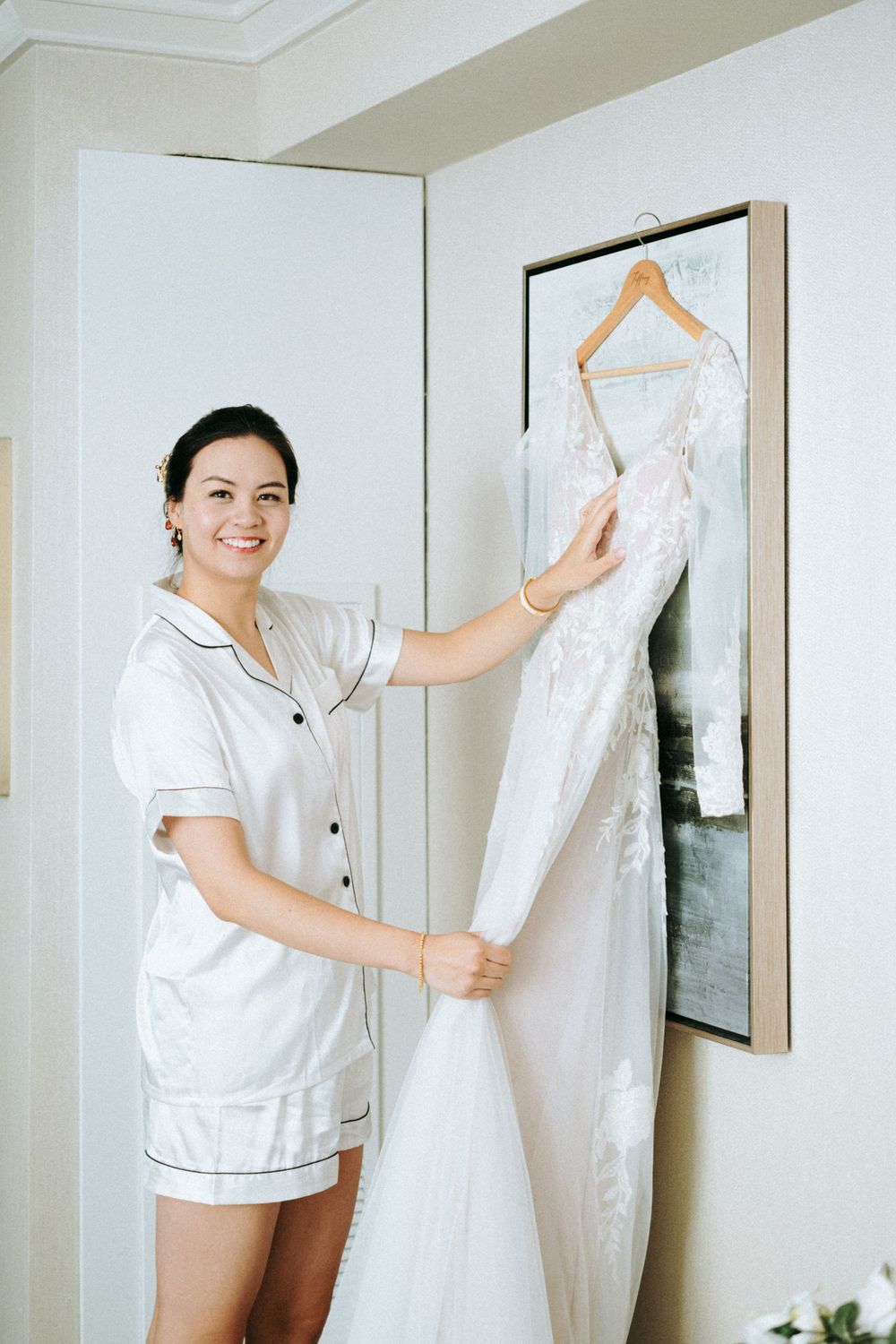 Tiffany and Sam getting ready at the Santos Hotel in Toronto before their Hart House wedding.