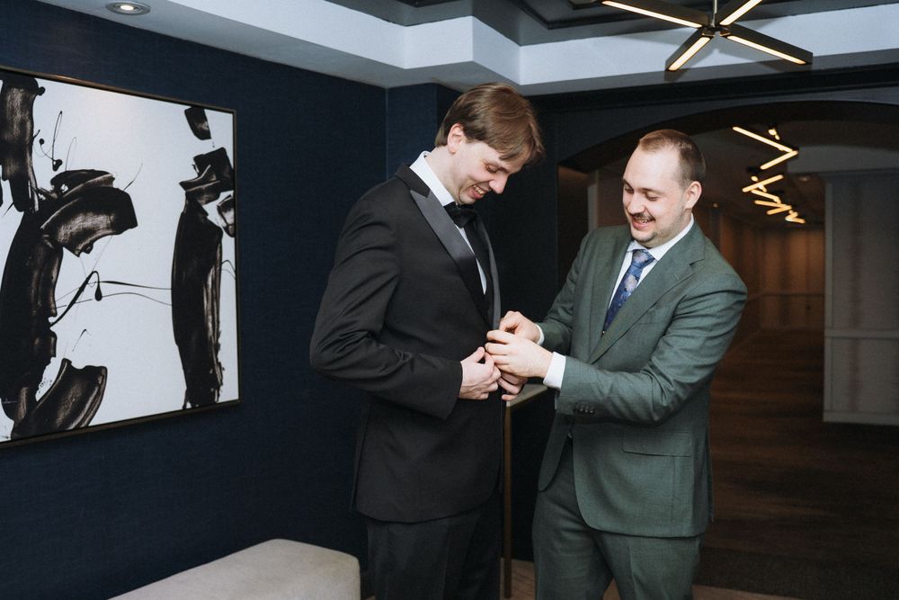Tiffany and Sam getting ready at the Santos Hotel in Toronto before their Hart House wedding.