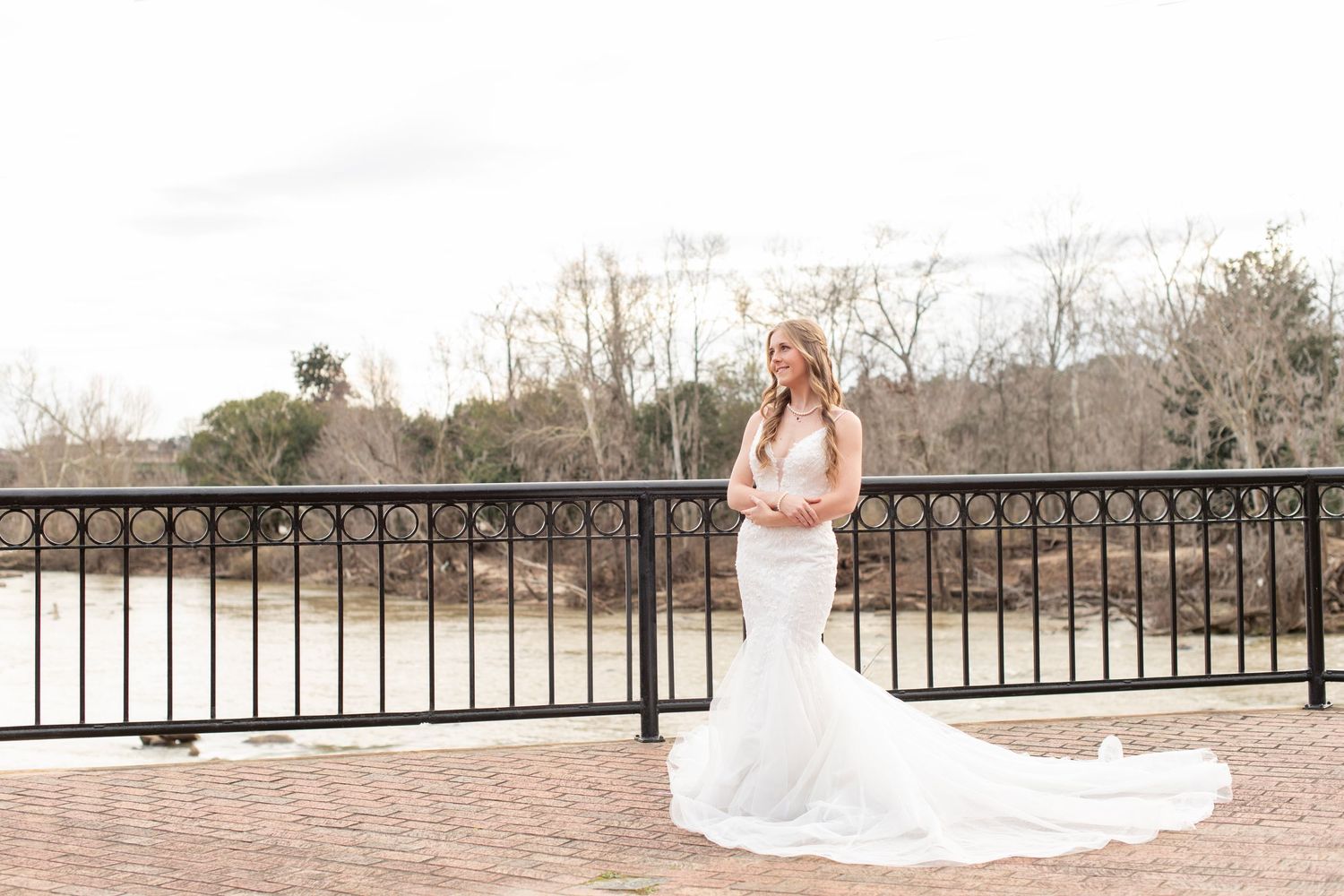 Bride poses for bridal portraits at Riverfront Park in Columbia, SC