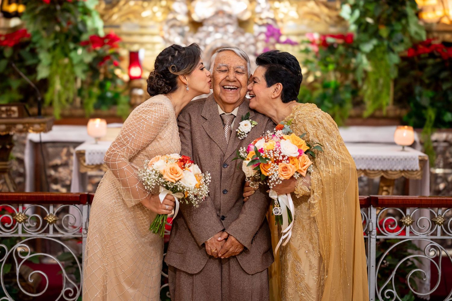 Golden anniversary celebration with couple surrounded by family during 50th wedding anniversary in church in Quetzaltenango, Guatemala
