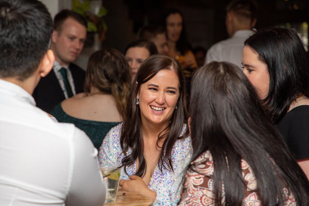 Candid photos with Happy couple celebrating their engagement with there guests in sydney at Shellhabour bar