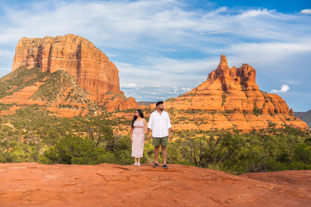 Stunning red rock formations of Sedona with hiking trails and desert landscape.