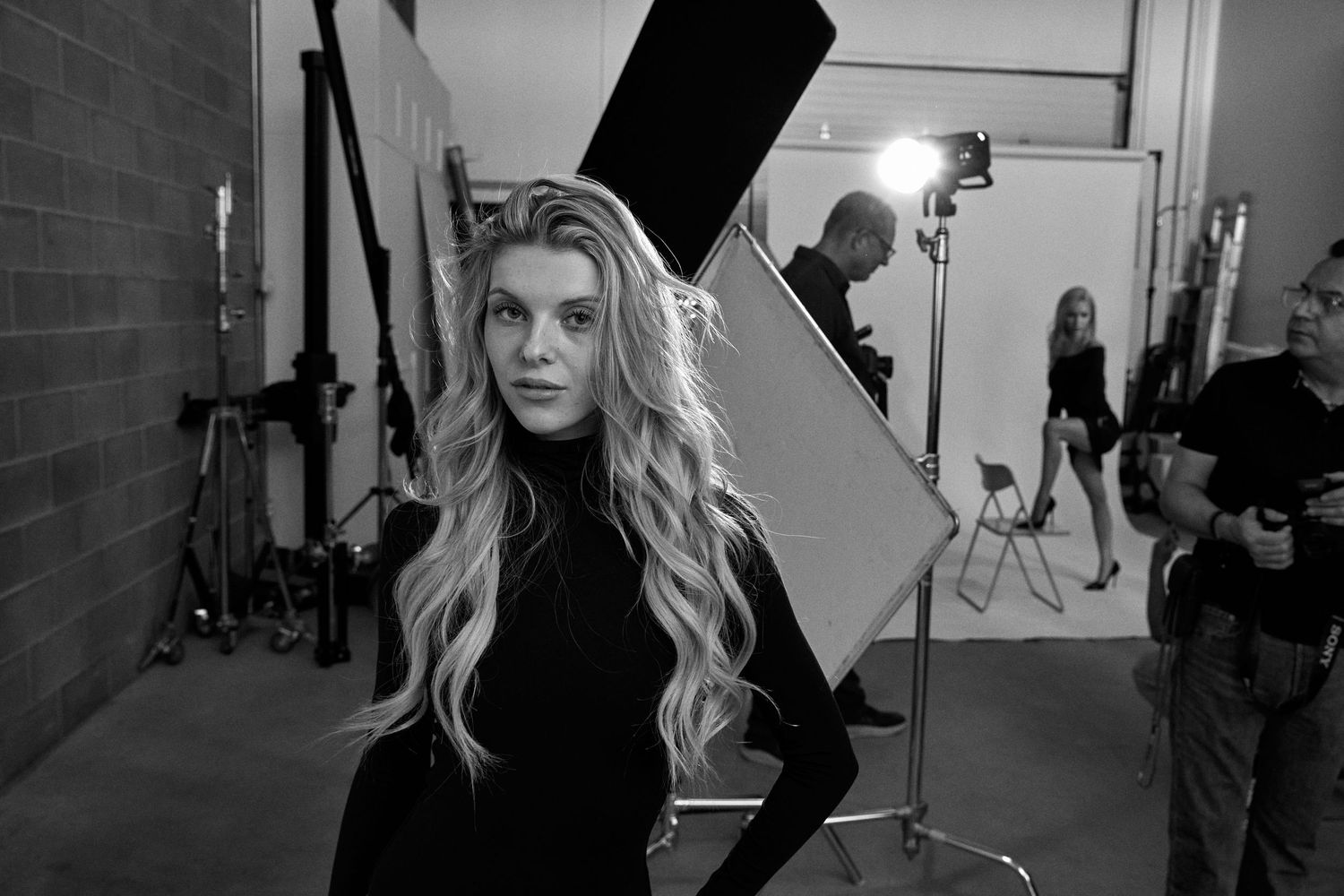 Behind the scenes photo shoot series showing dramatic lighting and shadows in a studio setting.