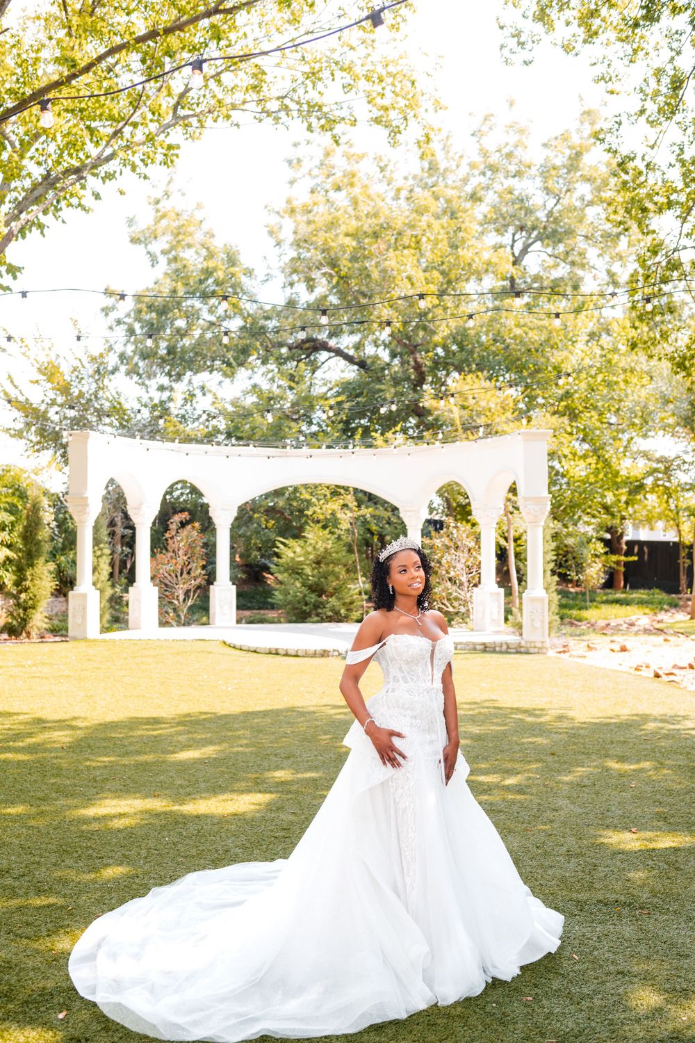 A series of romantic wedding photos showing a couple in white against a scenic outdoor backdrop with white columns.