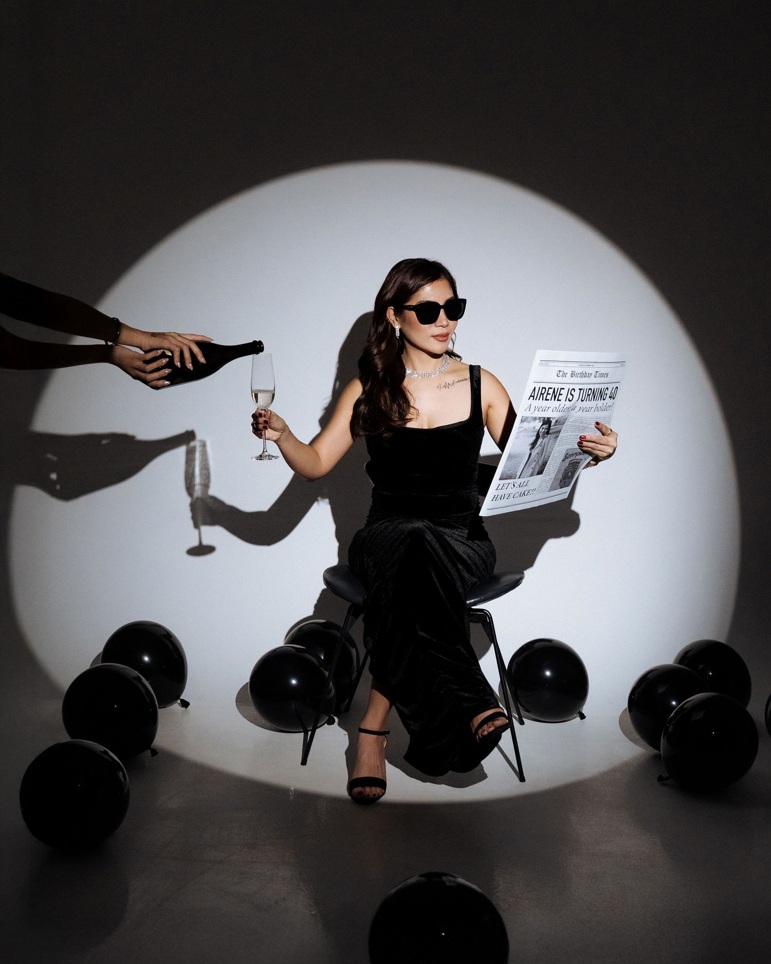 Creative studio portrait with dramatic spotlight lighting