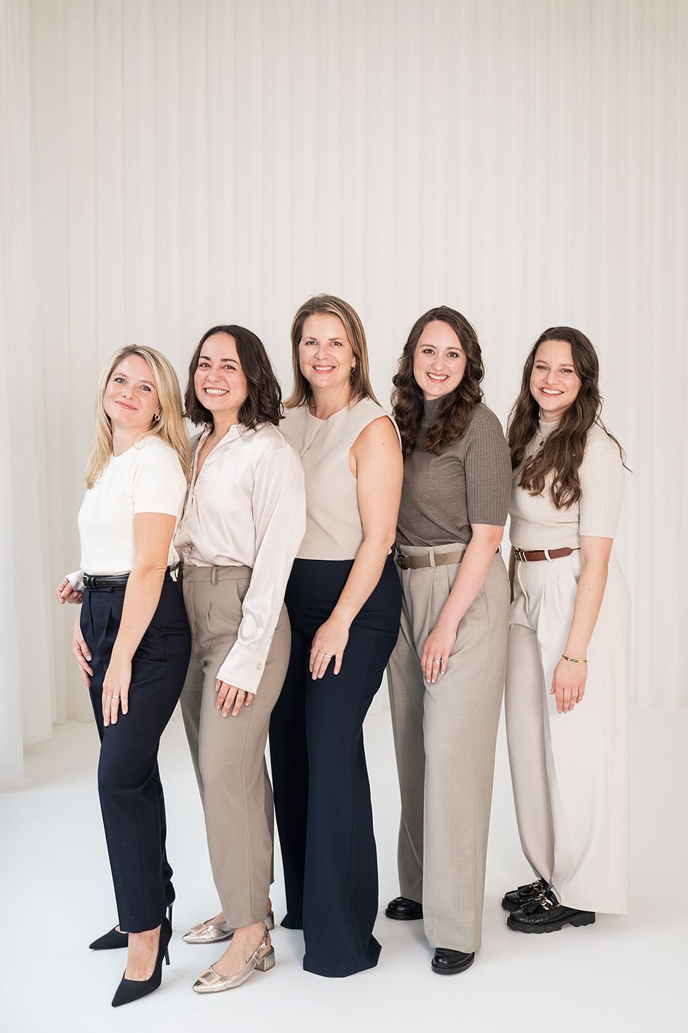 Warm natural-light portrait of wedding celebrant team from Simone Gori from LovelyWords, captured by MaxwellArt Photography.