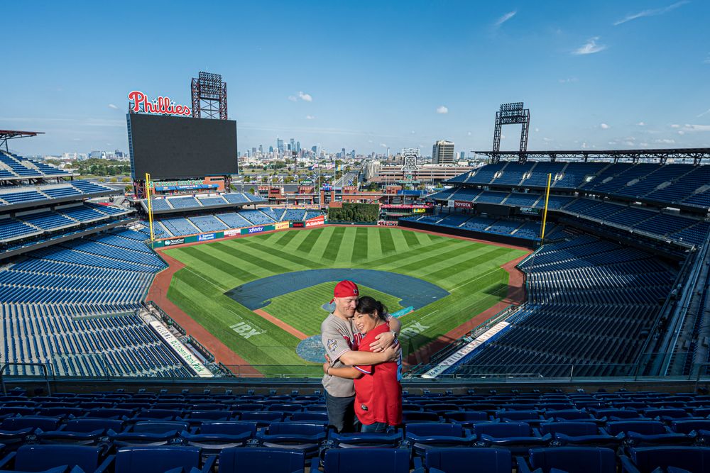 A panoramic collage of baseball stadium views showing empty blue seats and green outfield at Citizens Bank Park.
