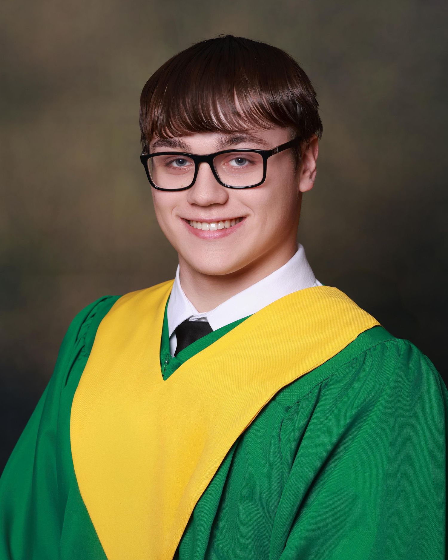 Senior Grad photo with traditional pose and clean backdrop