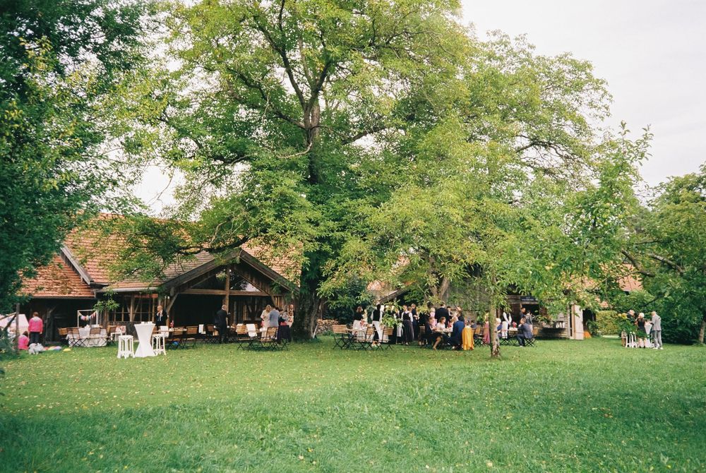 Analog wedding photograph captured on Kodak Gold 200 film, showing an honest and unposed moment.