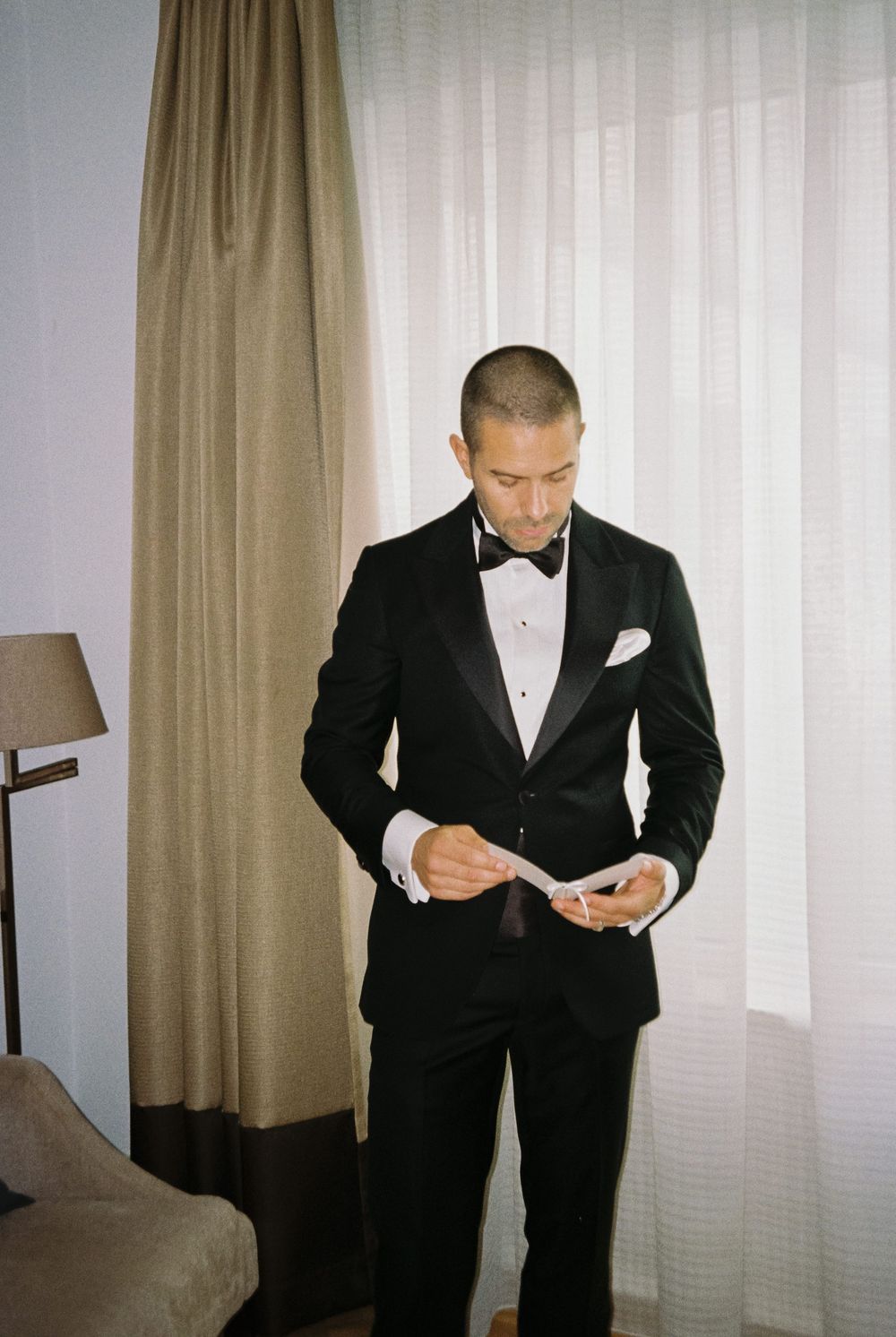 Analog wedding photograph captured on Kodak Gold 200 film, showing an honest and unposed moment.