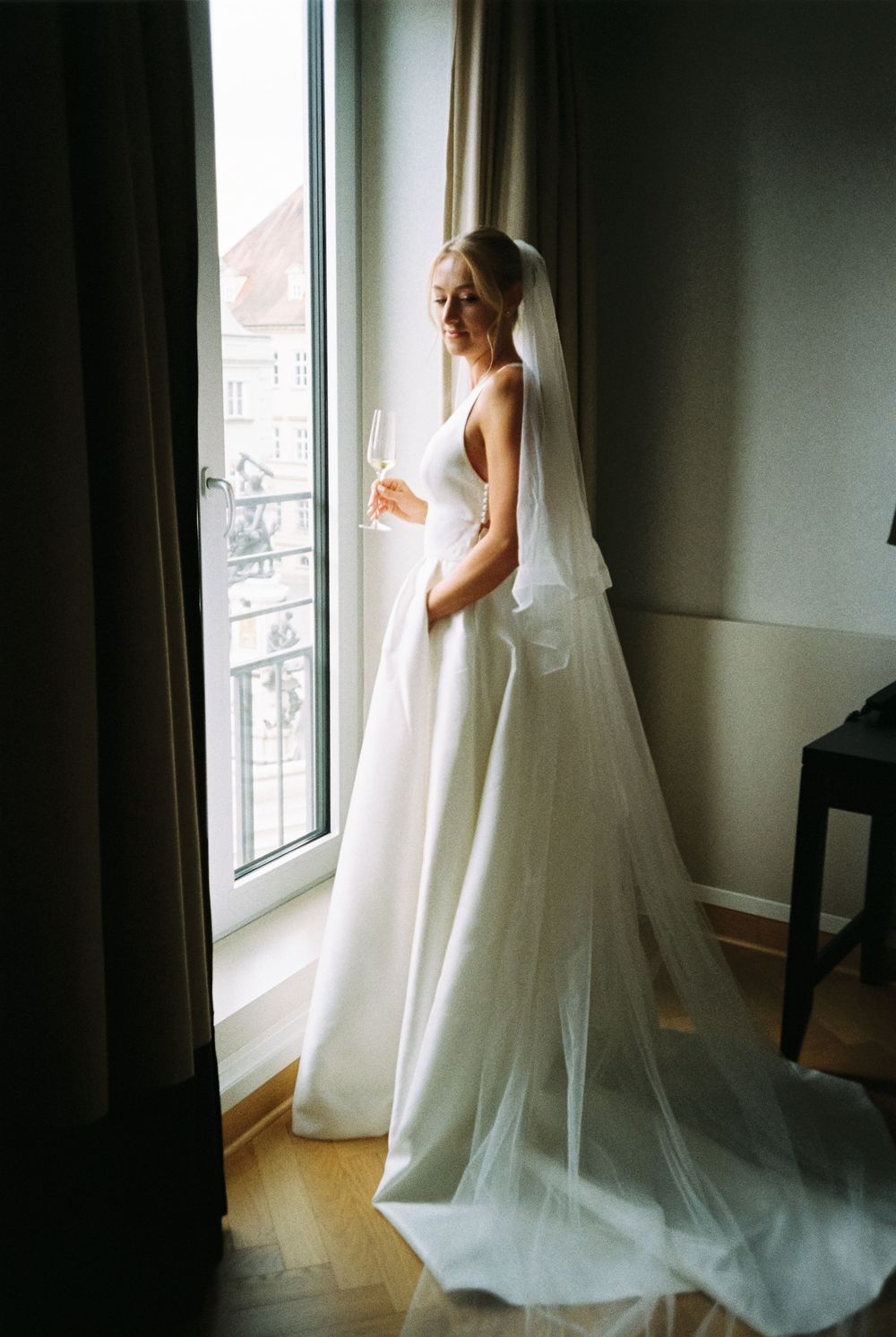 Analog wedding photograph captured on Kodak Gold 200 film, showing an honest and unposed moment.