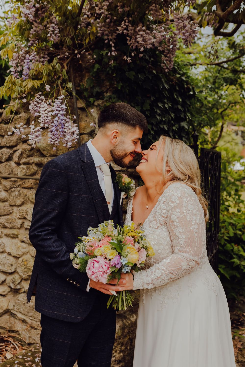 Close-up of bride and groom, Hannah and Jordan, at Montagu Arms, Beaulieu.