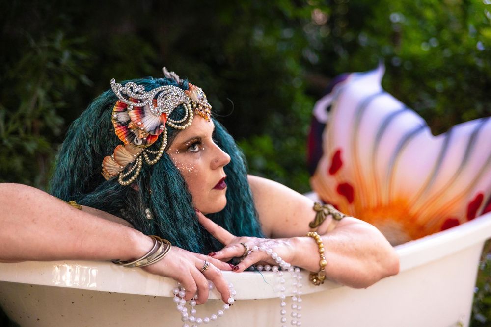 A beautiful mermaid in a bathtub.