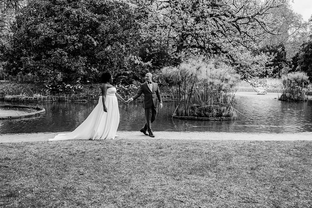 A romantic black and white wedding photoshoot series showing couples in outdoor garden settings and natural landscapes.