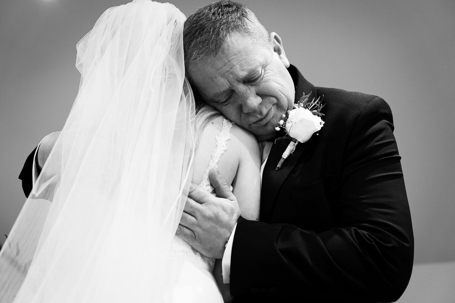 Intimate black and white wedding portraits showing tender moments. Doxford Barns