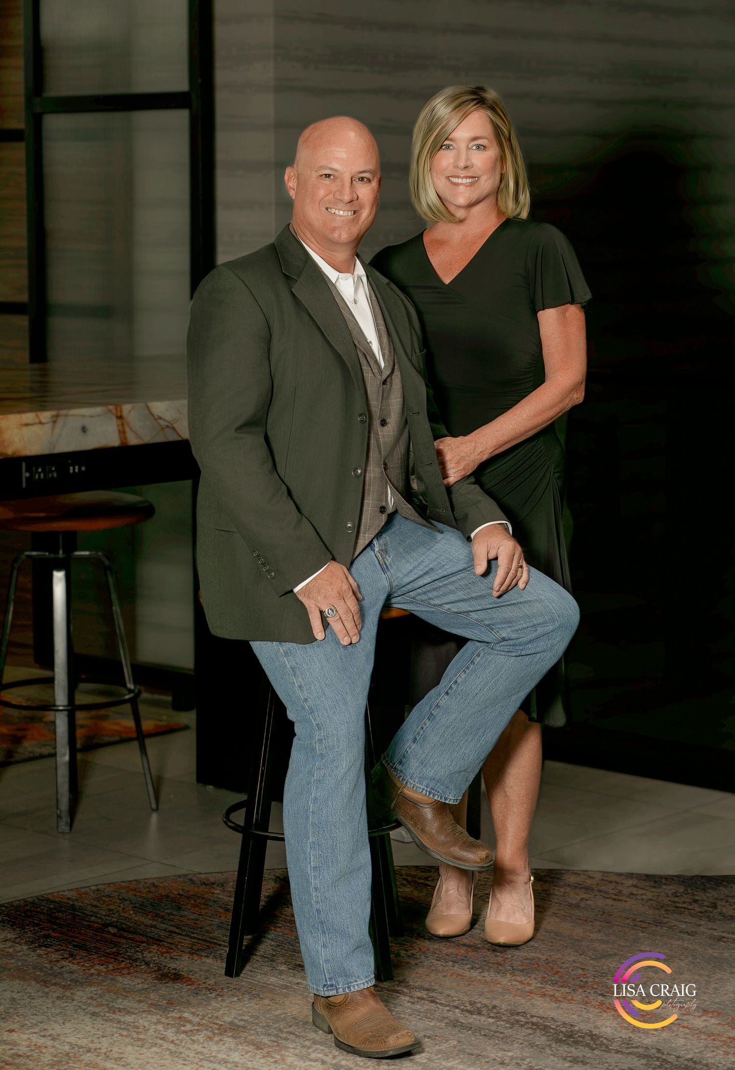 Authentic headshot-style portrait of a professional couple in Denver, Colorado, showing natural connection, confidence, and approachability