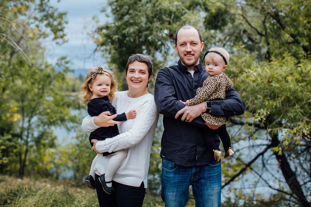 Casual outdoor family photo session with natural expressions and poses.