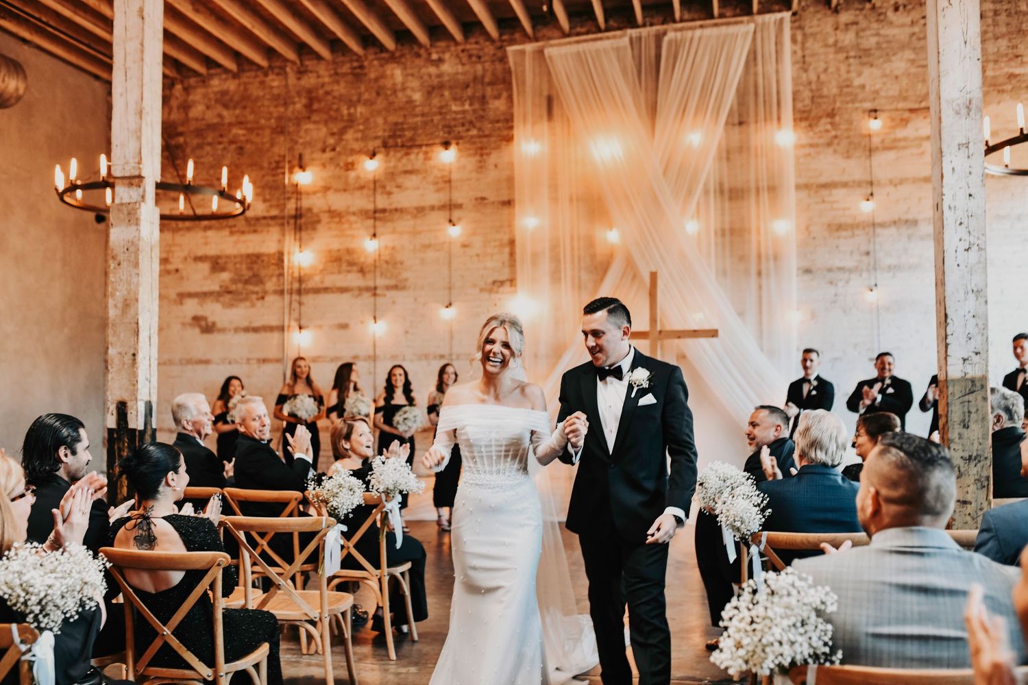 Modern industrial Dallas wedding at Brake & Clutch Warehouse with editorial styling and heartfelt worship moments.