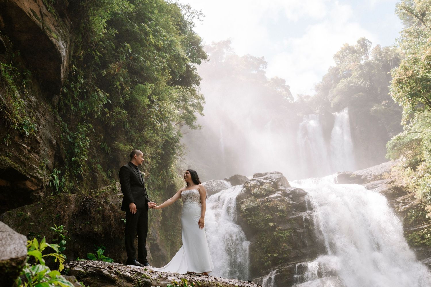 couple eloping in nauyaca waterfall in costa rica