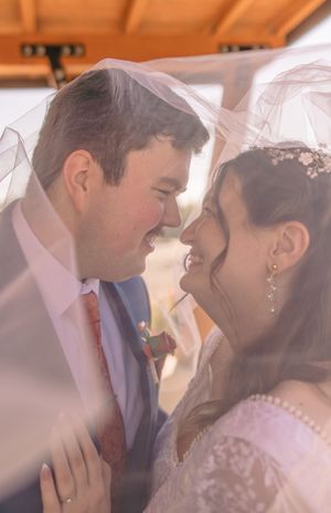 Romantic wedding sequence with soft orange lighting and intimate moments.