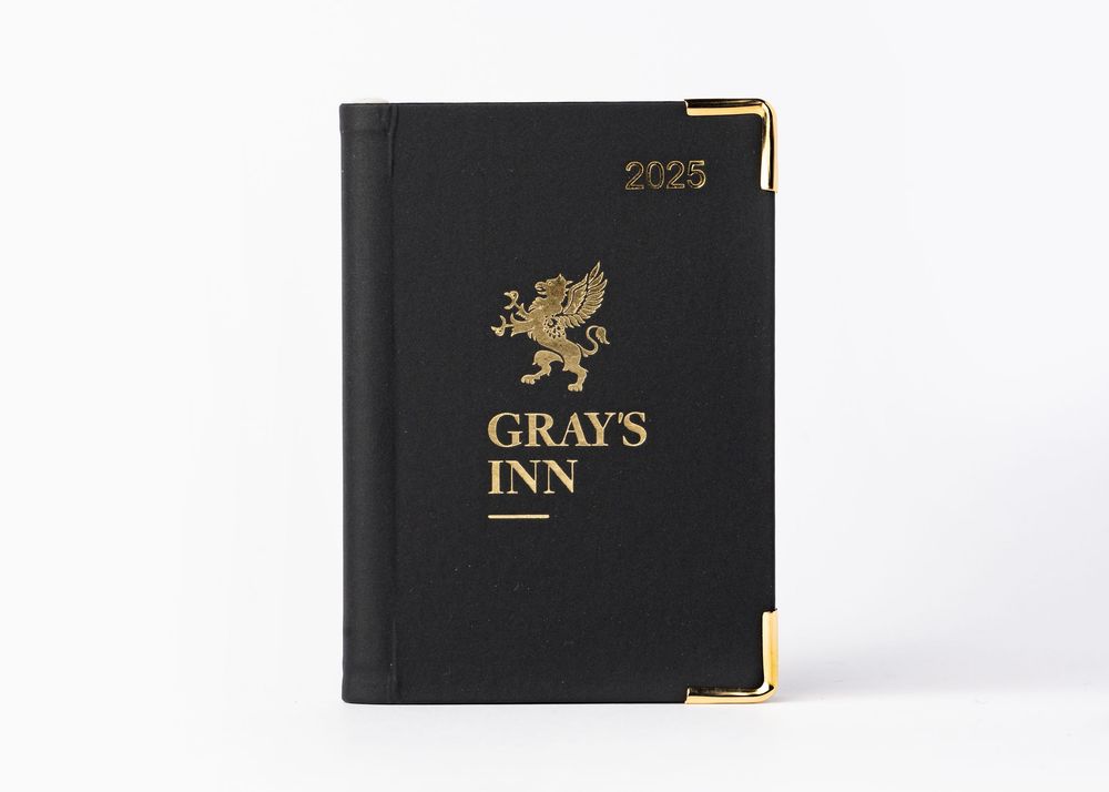 Black leather diary with gold embossed Gray's Inn logo and 2023 text on the cover.