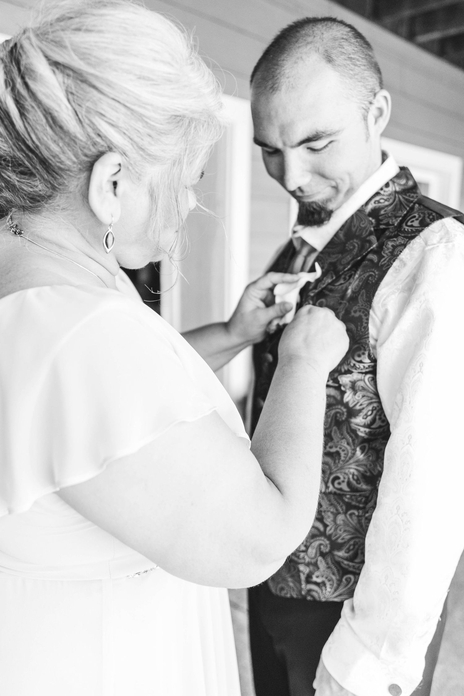 Wedding preparation sequence showing emotional moments as couple gets ready.