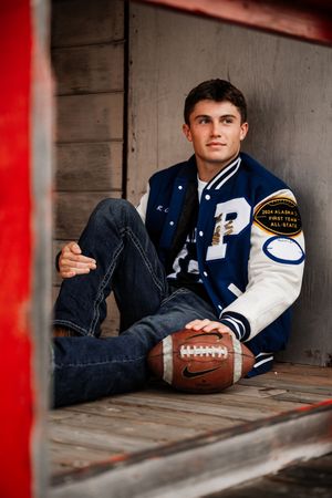 Senior photography session in New Hampshire with football player.