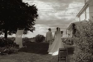 Black and white wedding photography capturing outdoor ceremony moments.