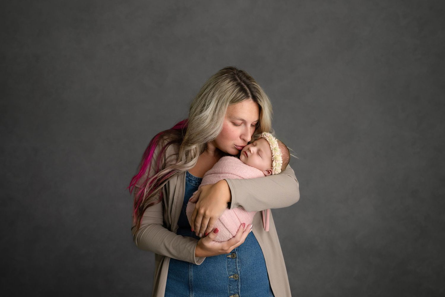 Emotional embraces between two people shown in a series of dramatic black and white photographs.