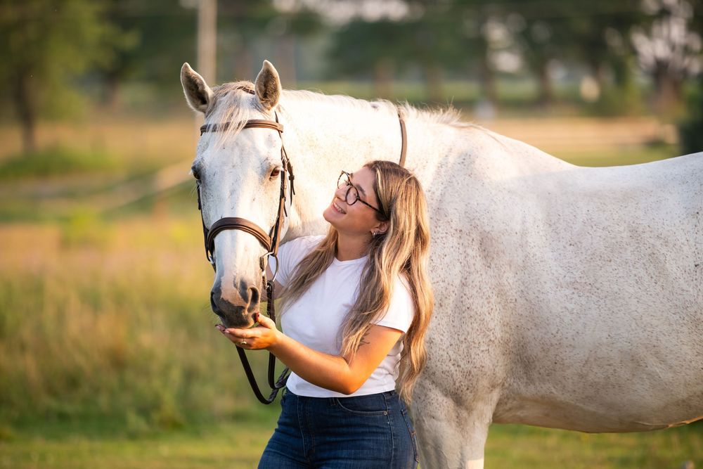 A series of outdoor photos showing various interactions with a white horse in a rustic country setting.