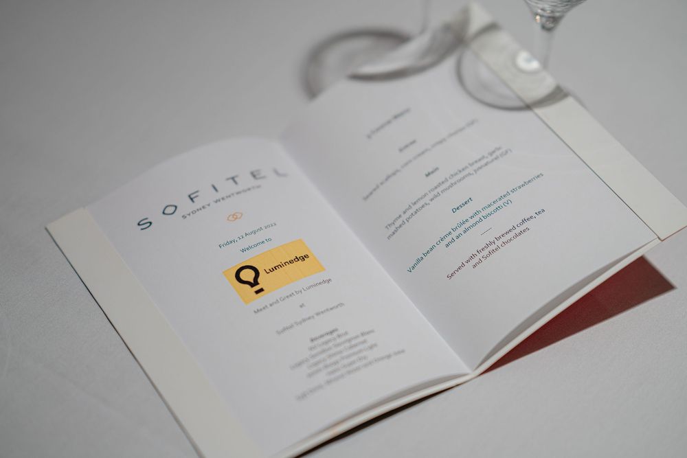 Open document with Luminedge branding and logo on white paper.