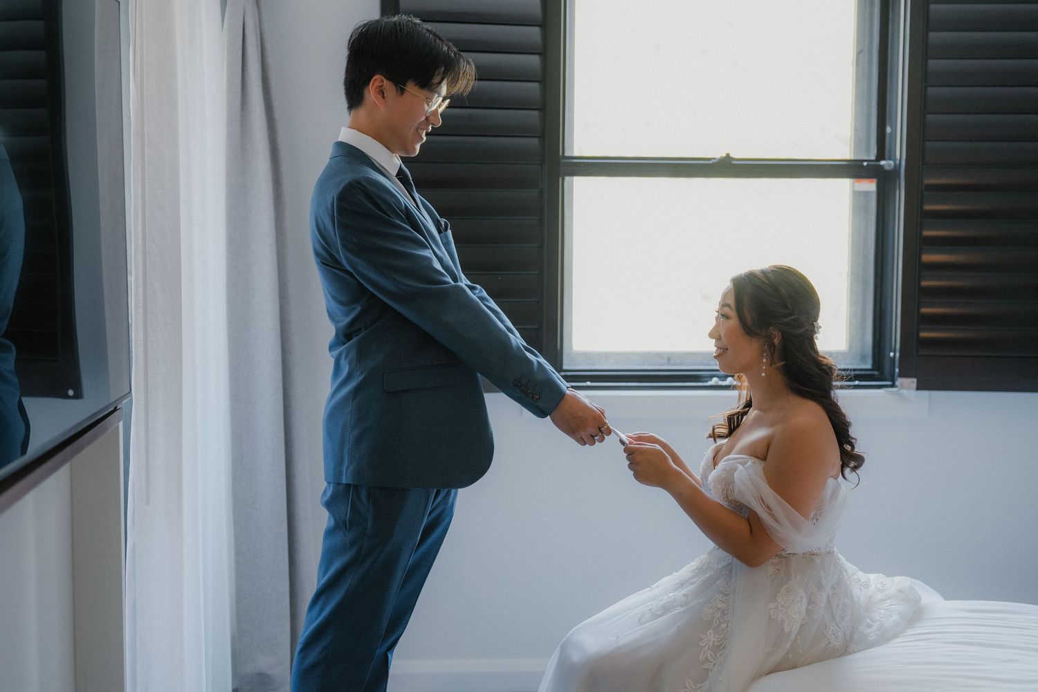 A romantic wedding couple sharing intimate moments together in a series of tender close-up shots.