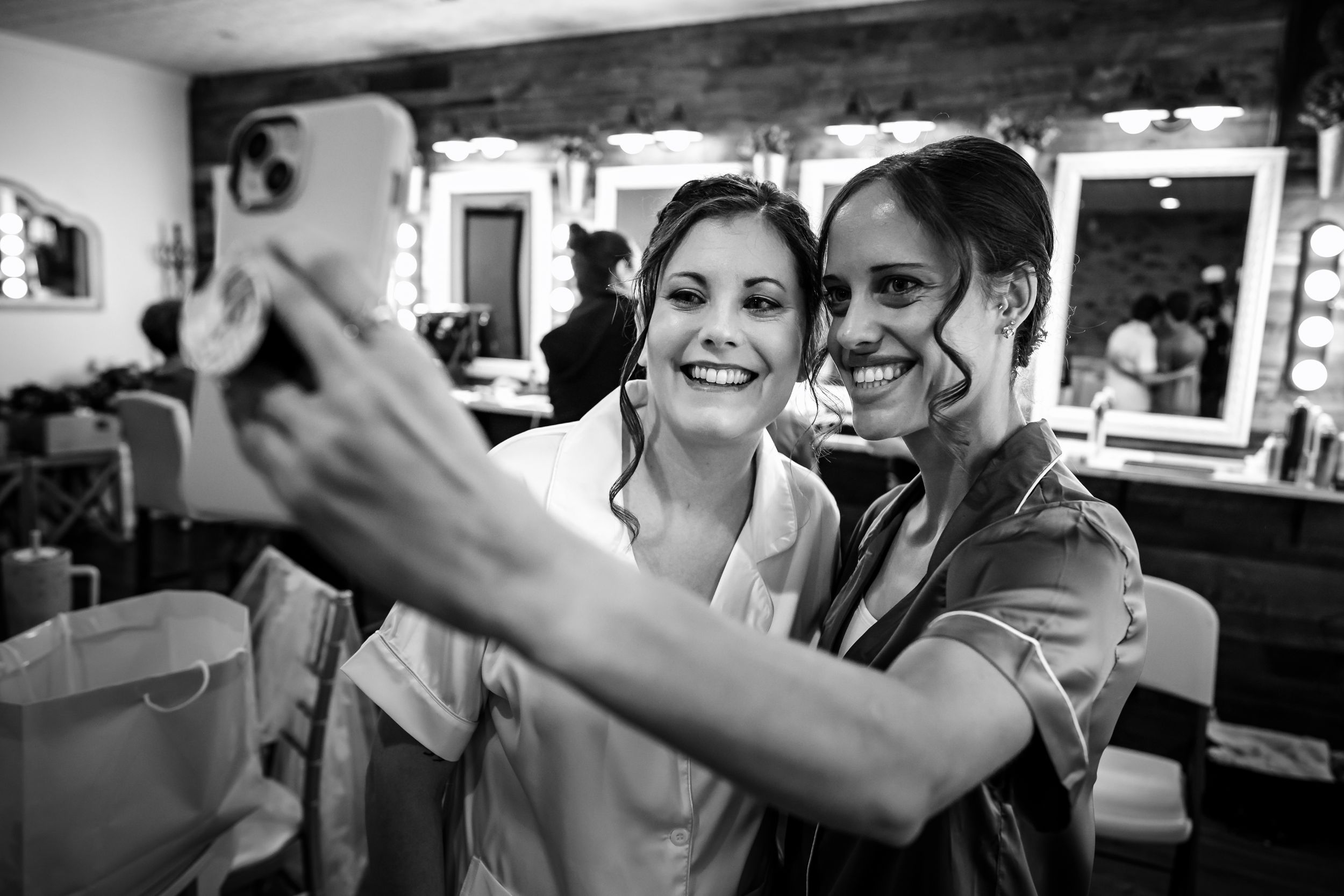 Black and white candid shots capturing pre-wedding preparation moments.