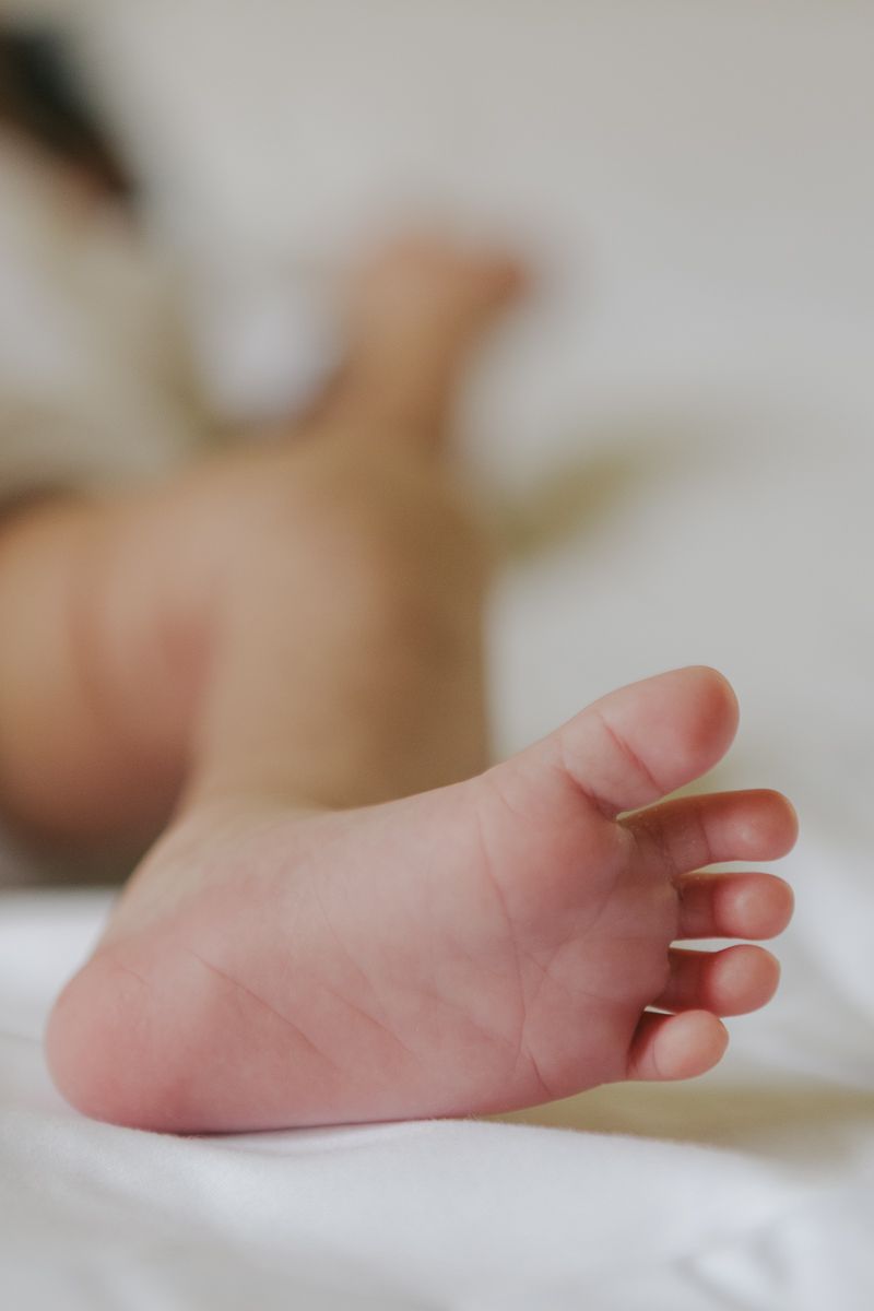 Little newborn foot and toes detail, NYC lifestyle baby photography