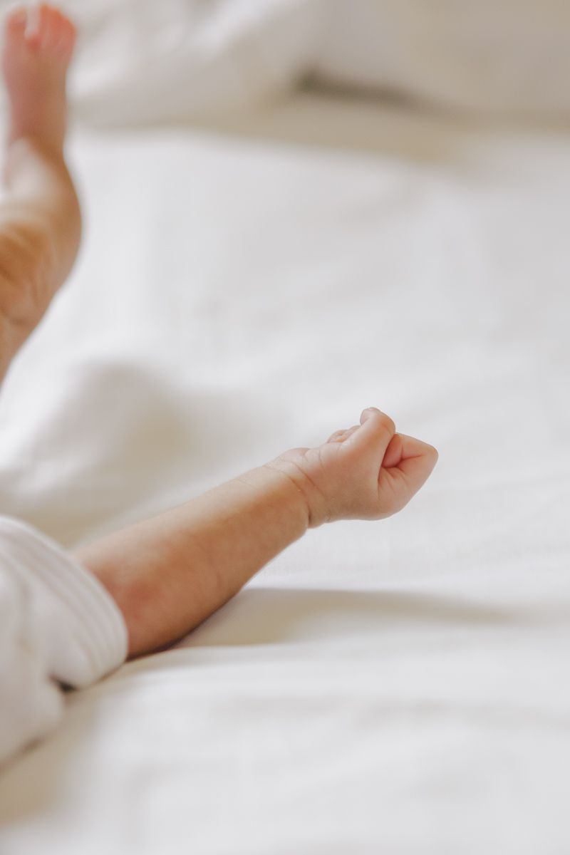 Close-up of newborn baby’s tiny hand, photographed at home in NYC