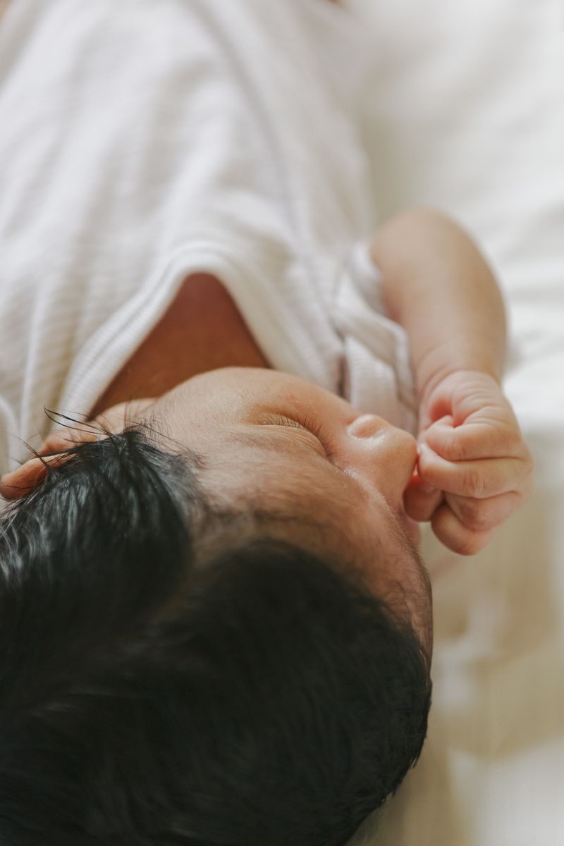 Detail of newborn baby’s nose during in-home NYC photography session