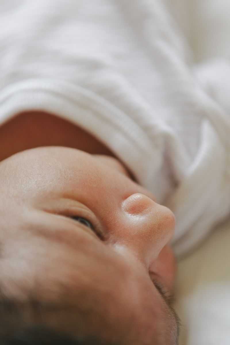 Close-up of newborn baby’s nose and eyes, lifestyle photos in NYC
