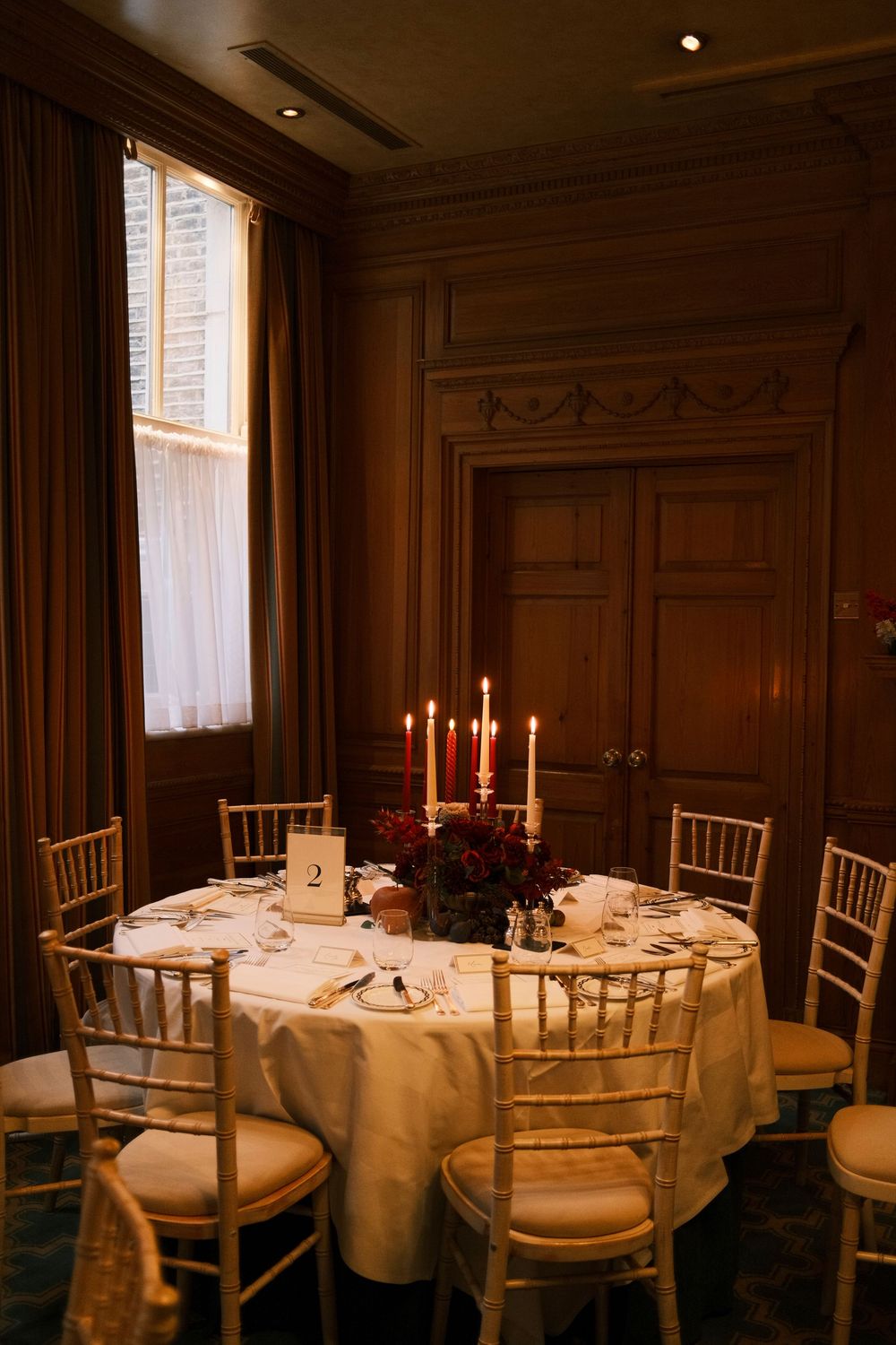 Luxury candlelit dinner decor and warm lighting at The Milestone