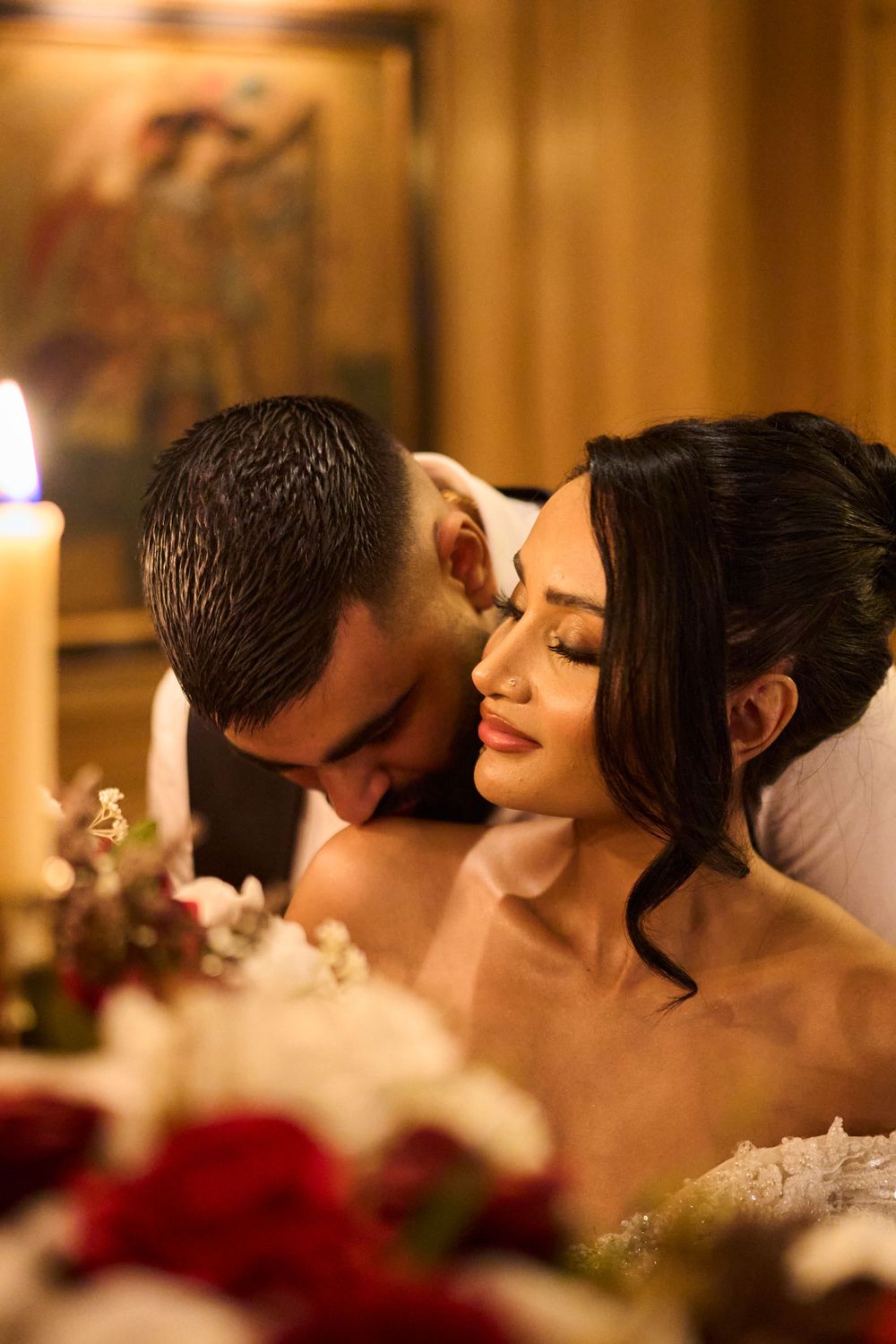 Candlelit reception moments with nostalgic, warm film grain